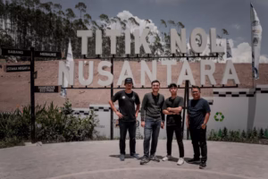 a group of three men standing next to each other